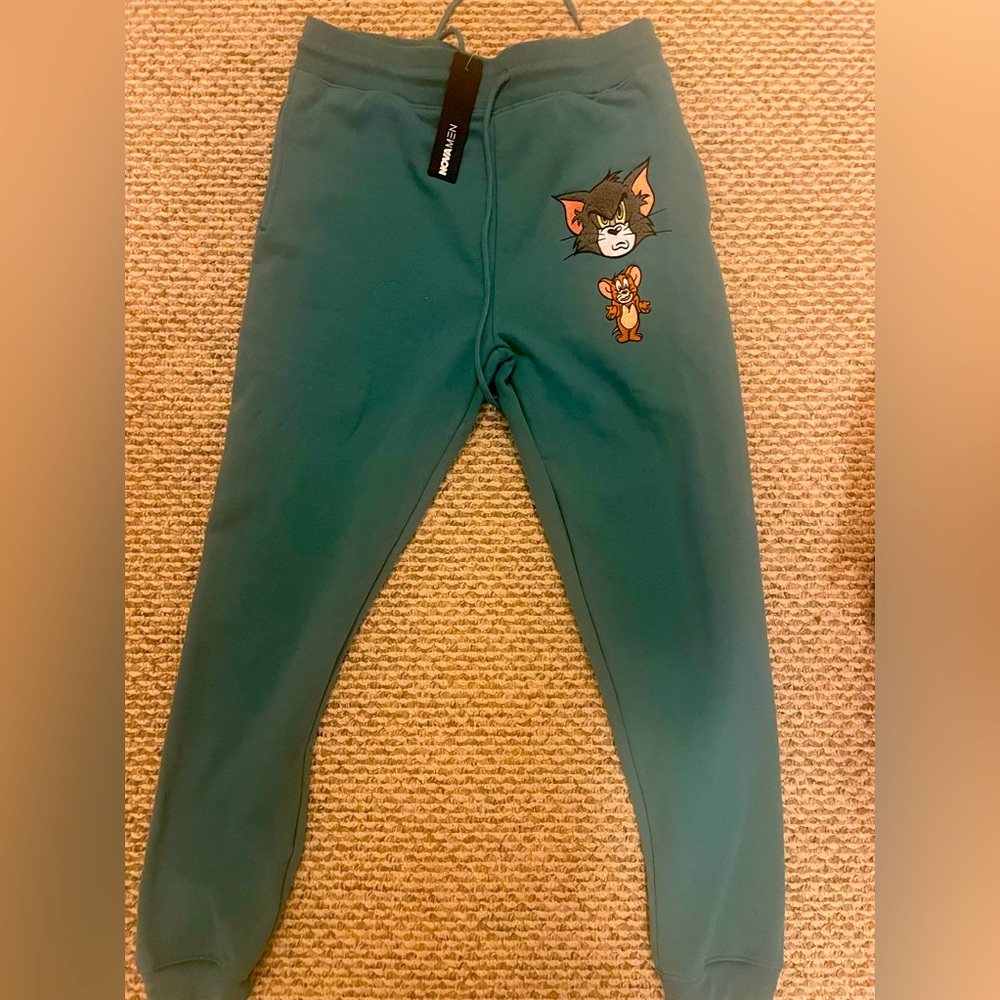 Fashion Nova Size Small Men’s Light green Looney Tunes sweatpants new with tags